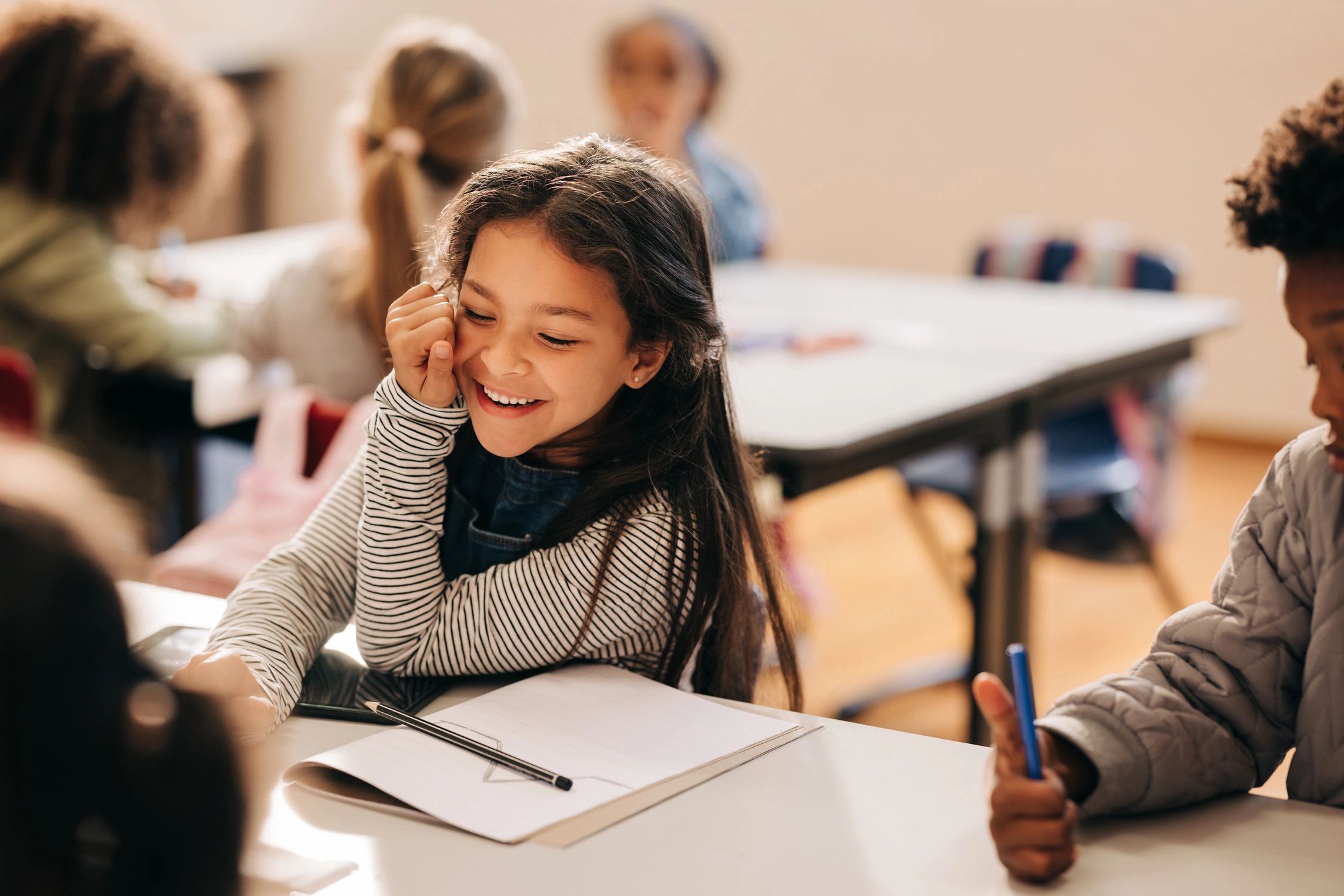 Smiling child in a classroom