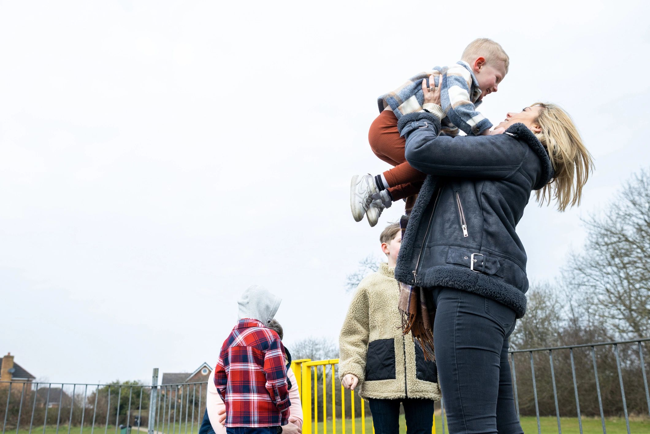 Children playing together outdoors on a playground