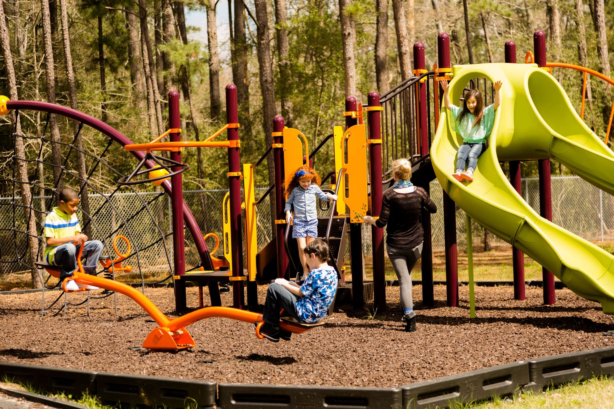 Children playing outside on a playground